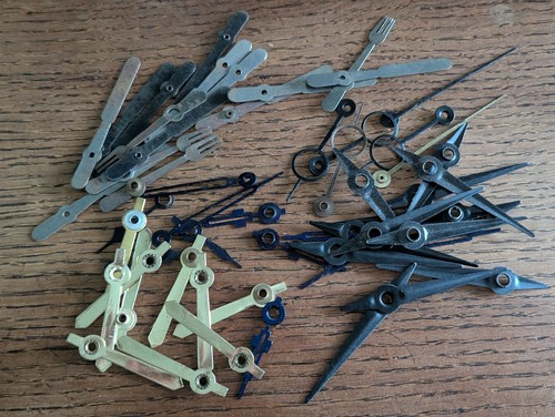 Clock hands new old - new,