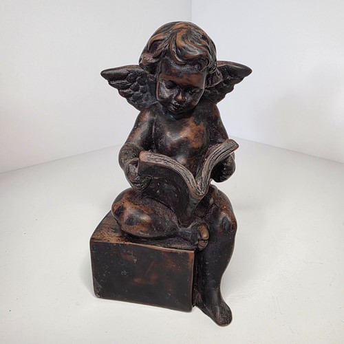 Seated cherub angel figurine - seated,