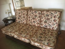 ercol 3 piece suite. excellent condition dark wood. 2 armchairs and a sofa