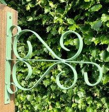 Wall bracket for hanging