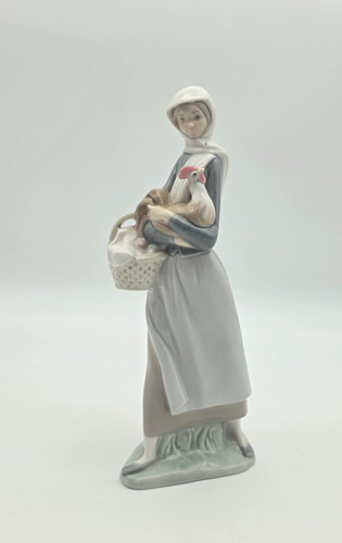 Figurine lladro girl with - -,