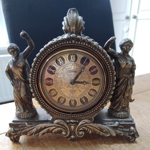 Coral mantle clock - coral, wind