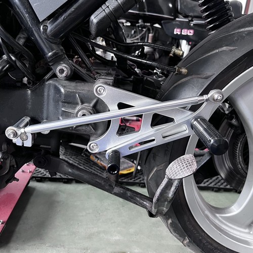 Relocated footrest system bmw - relocated,