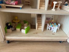 Pintoy Marlborough Dolls House with furniture and dolls.