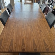 Dwell Attra 6-10 Seater Extending Dining Table in Walnut with Brushed Steel Legs