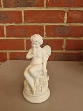 "Mischievous Cupid" sculpture