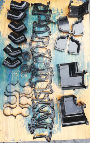 Black ogee gutter fittings job - black,