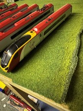Dapol And Virgin Trains Pendolino EMU - tilting action with 4 carriages 