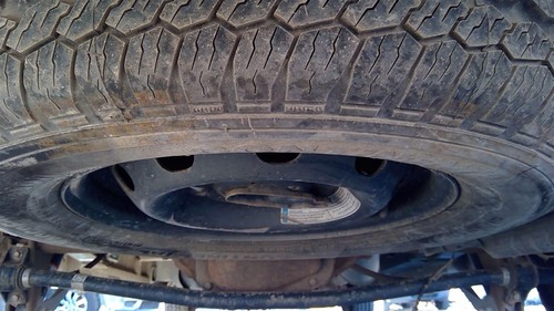 Used spare tire wheel - spare,