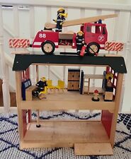 Pintoy/John Crane Wooden Fire Station and a Fire Engine, plus accessories.