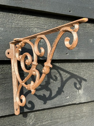 Cast iron scroll - cast, bracket