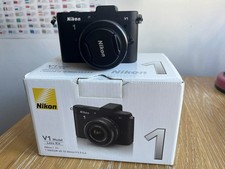 Nikon 1 V1 Camera, 10-30mm VR Lens, 3 Batteries, Flash, Additional Accessories