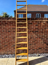 WOODEN LOFT LADDER APPROX 9FT 