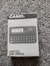 Casio Data CAL DC-200 calculator, boxed with booklet and Wallet - Working