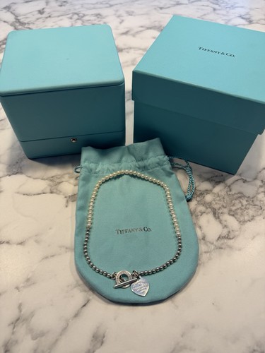 Return tiffany wrap - return, to