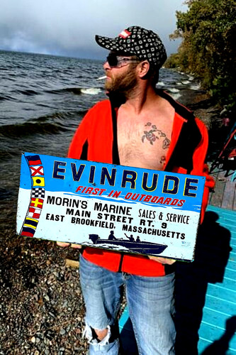 Vintage old metal evinrude - metal,