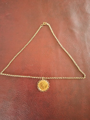 Gold sovereign with 9 - cm,
