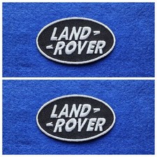 A Pair Of Motor Car Racing