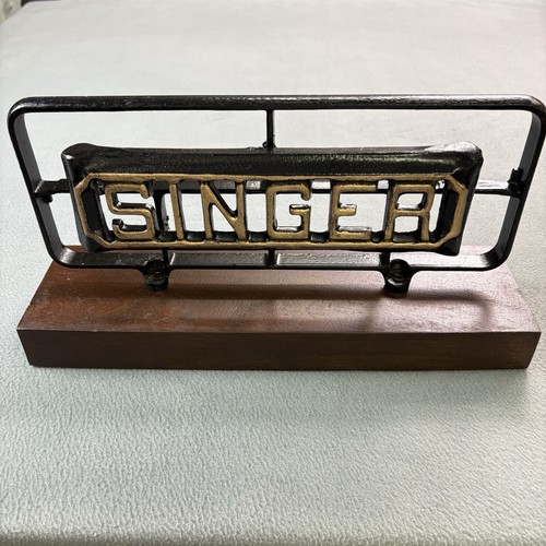 Antique cast iron singer - cast,