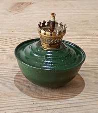 A small table top oil lamp