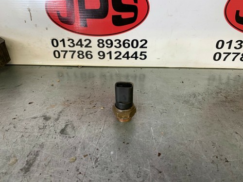 Engine coolant radiator fan