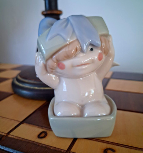 Nao lladro cheeky cherub - by,