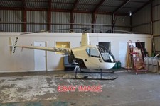 PHOTO  HELICOPTER  ROBINSON R22 BETA 'G-SUMX'  C/N 3274 BUILT 2001 HANGAR 10  MA