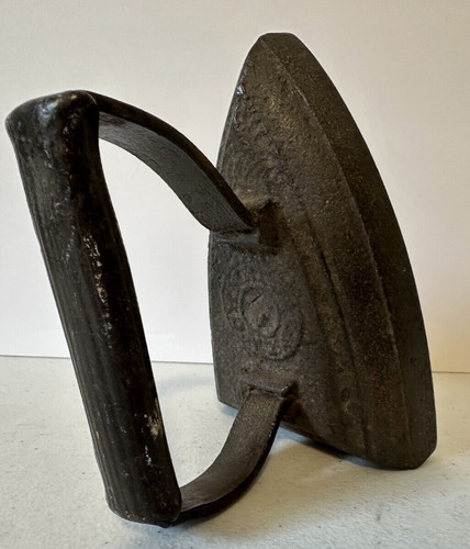 Antique sad cast iron vintage