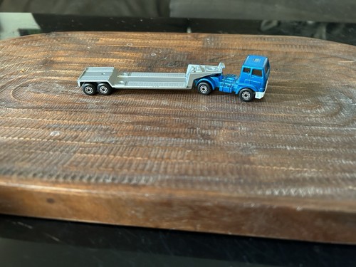 Blue articulated truck - blue,