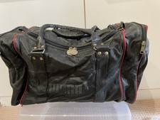 vintage puma holdall, black with gold lettering, approx 20"x 10"x 10"