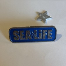 Merlin sealife logo pin - sealife,
