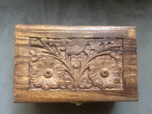 Hand carved wooden floral - hand,