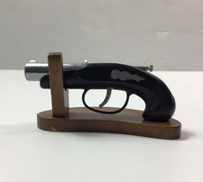 Vintage Flintlock Table Lighter with Wooden Stand.