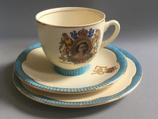 CLARICE CLIFF NEWPORT POTTERY QUEEN ELIZABETH II CORONATION CUP, SAUCER & PLATE