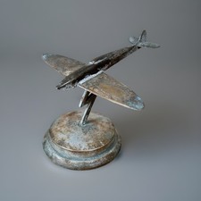 Vintage Brass Desk Model Paperweight Of RAF Spitfire On A Lightening Bolt Stand
