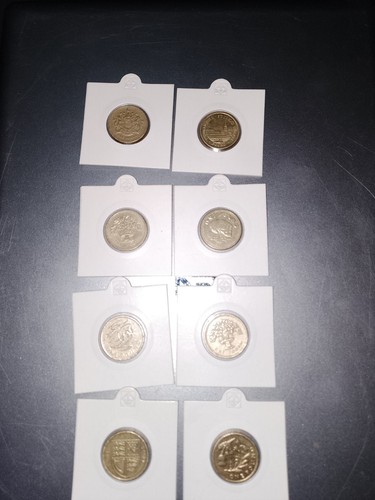 Eight old pound coins
