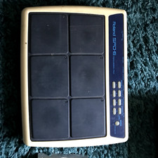 Roland SPD 6, used but fully working with stand attachment, no power supply. 
