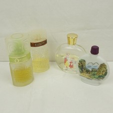 Four vintage perfume bottles