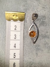 Pretty Silver And Amber Stone