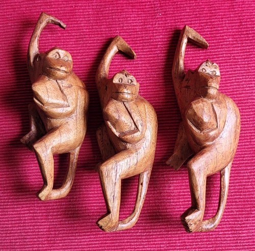 Three wooden monkey - three,