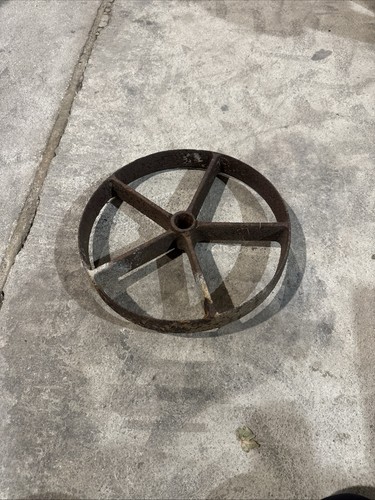 Antique cast iron cart wheel - cast,