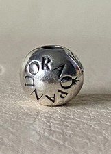 Genuine Pandora Sterling Silver logo clip/stopper charm #791015