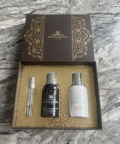 Molton brown charge black - brown, re-charge