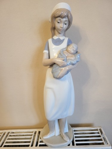 Nao lladro midwifery figurine - lladro,