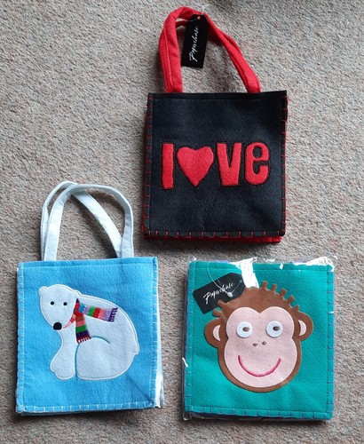 Three felt gift bags - three,