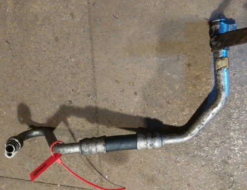 Engine oil cooler return - oil,