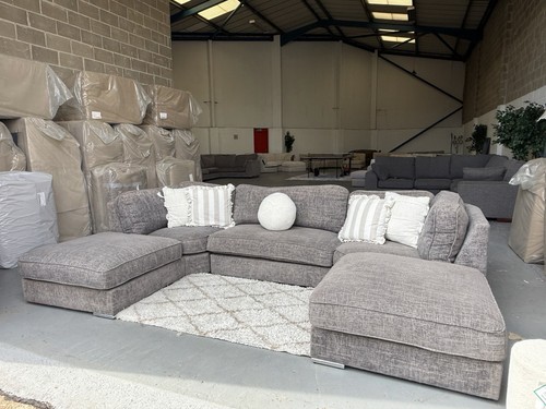 Grey sofa club shape - u, in