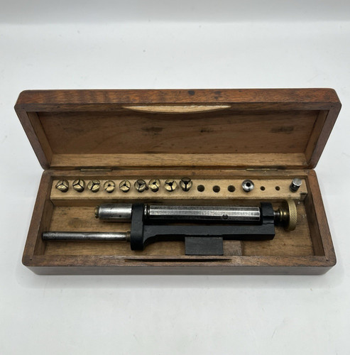 Watchmaker screw head - watchmaker's,