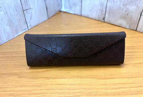 Gucci embossed brown - embossed,