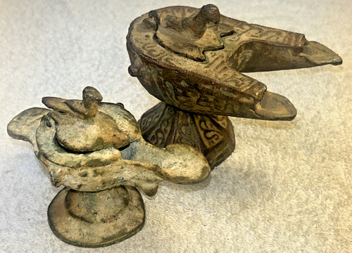 Ancient cast bronze oil - cast,